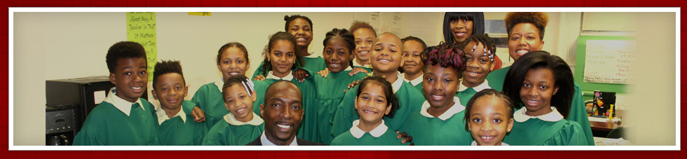 students in green robes